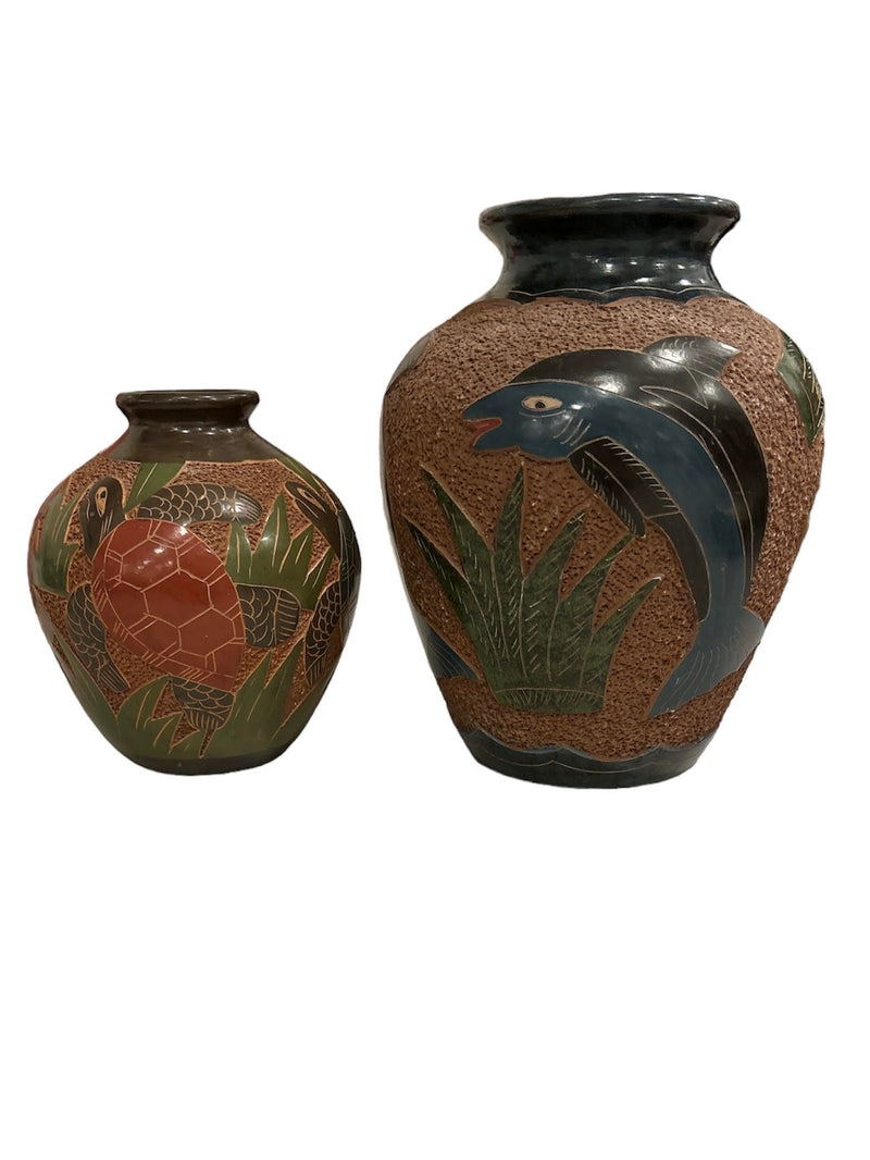 Decoratively Carved Pottery Vases
